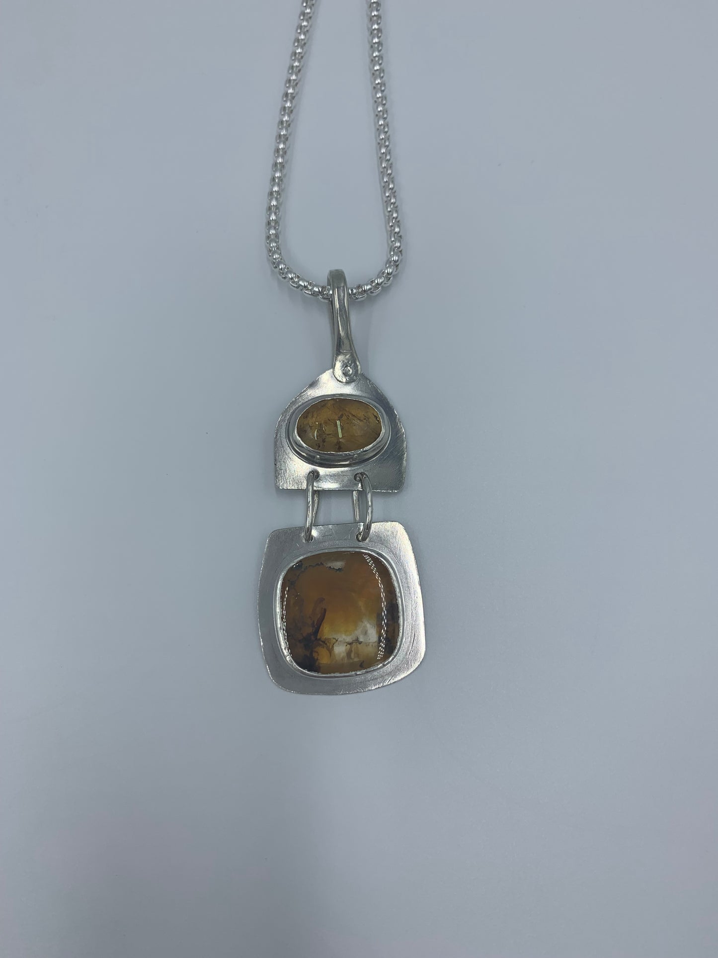 Amber set in sterling silver .925 (Pendant only)  28.09mm x 73.65mm